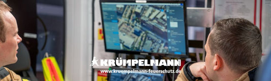 Dräger FireGround Software auf Bildschirm mit Feuerwehrmänner
